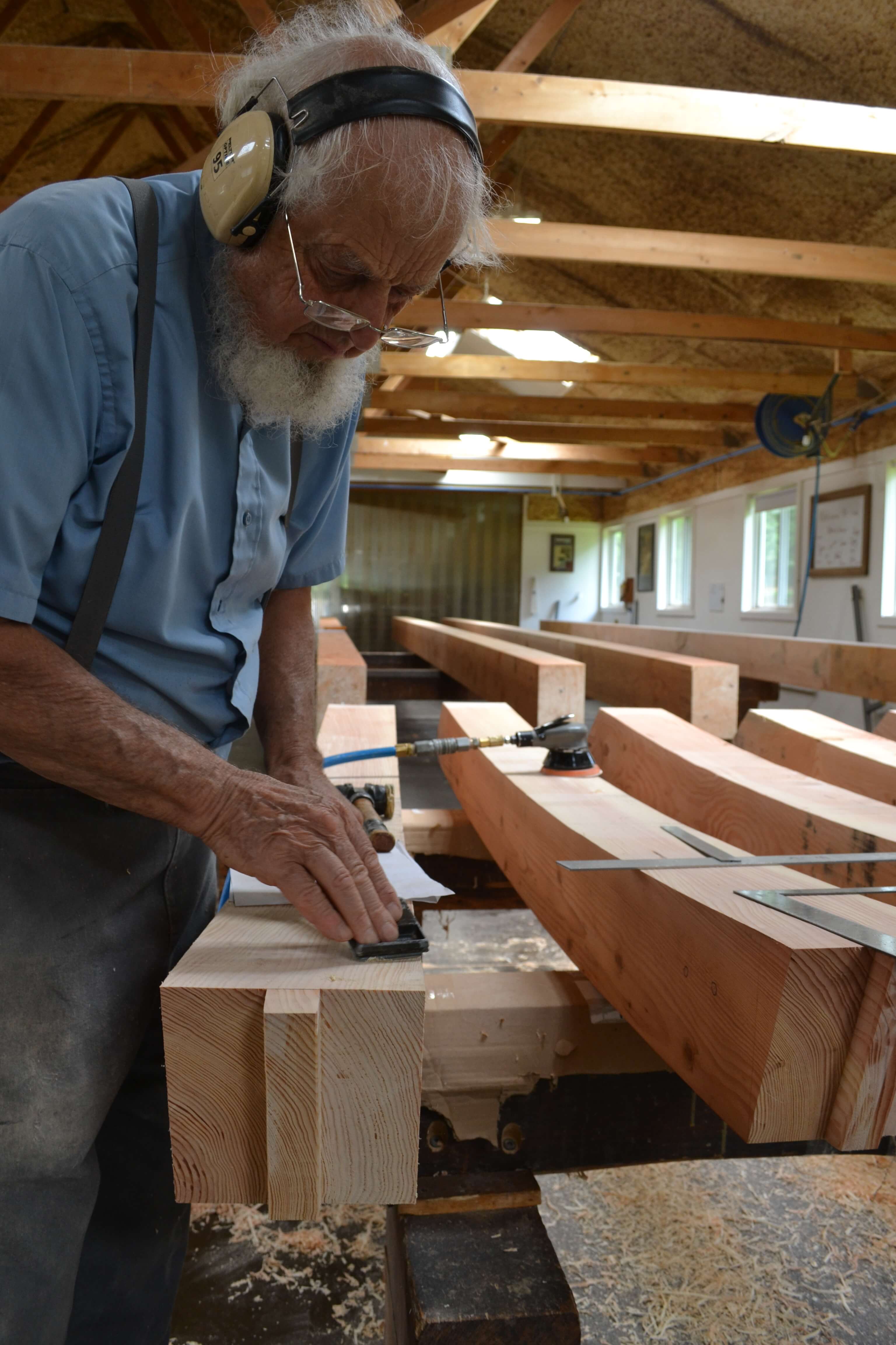Amish craftsman build beams for the entrance to Fixari Family Dental of Lewis Center