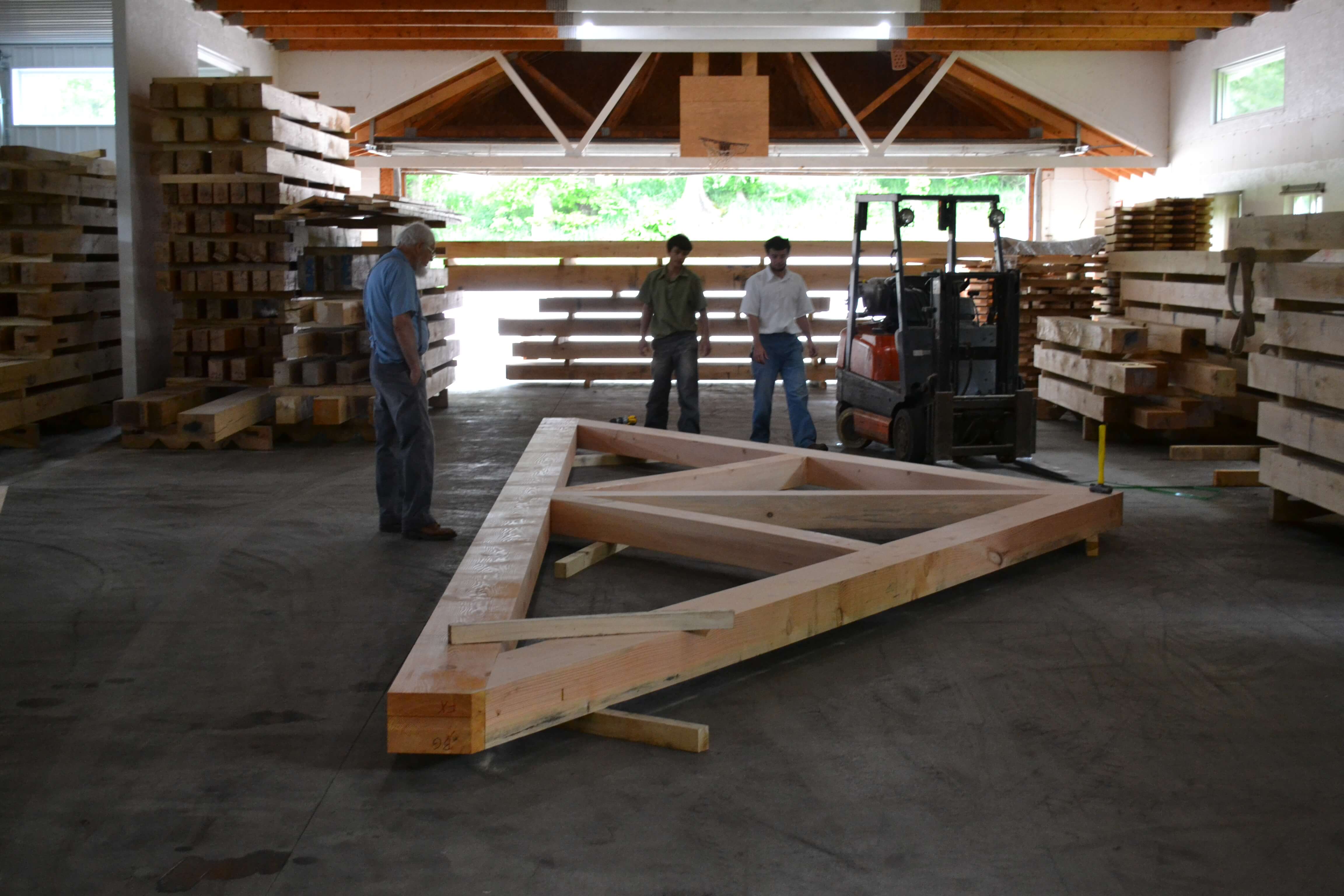 Amish craftsman build beams for the entrance to Fixari Family Dental of Lewis Center